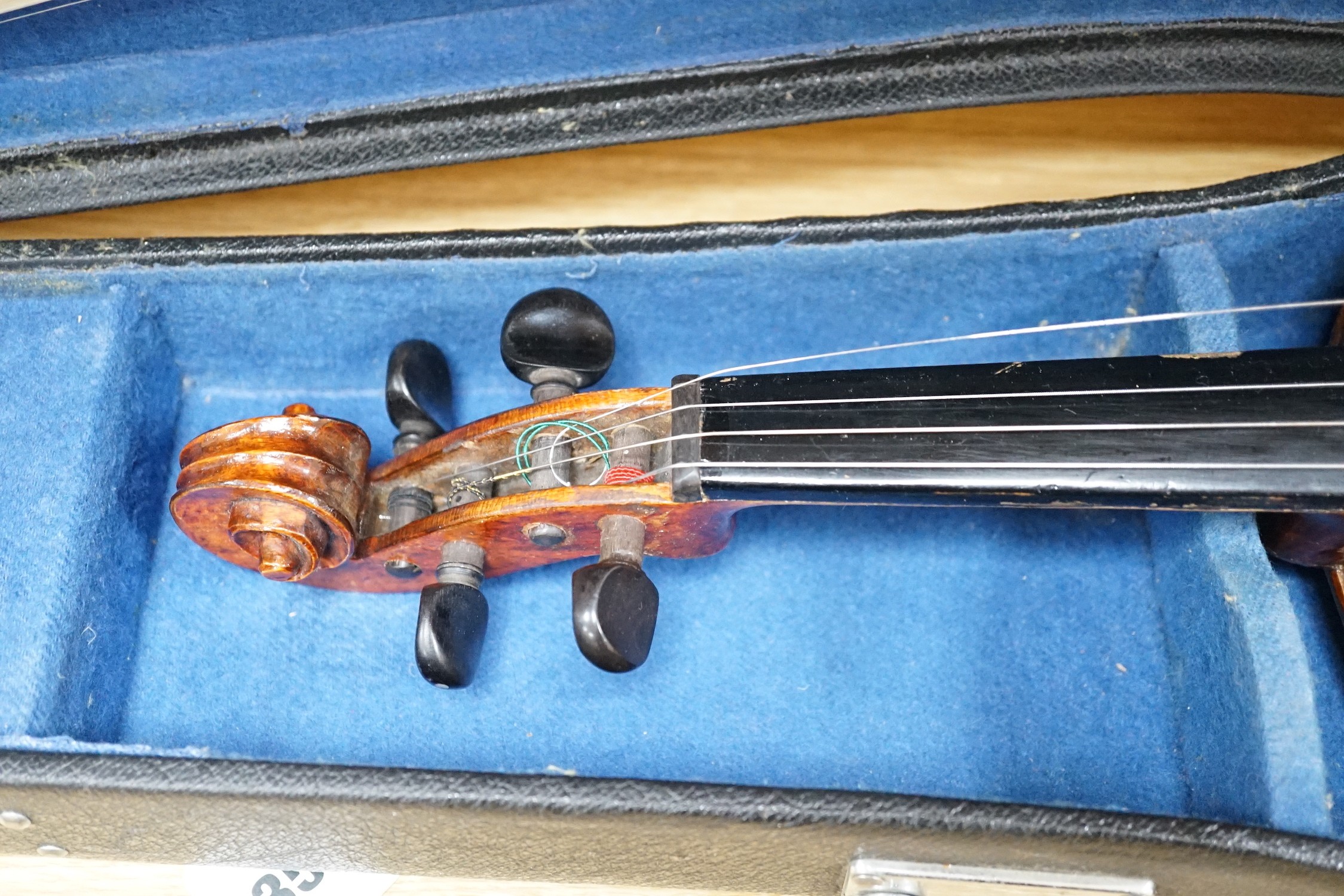 A Stentor violin, cased, 59cms long